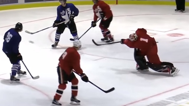 Eddie Lack snipes in full equipment at Pro-Am game