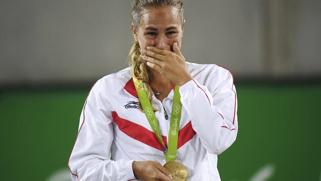 Puig stuns Kerber to give Puerto Rico its 1st-ever gold medal