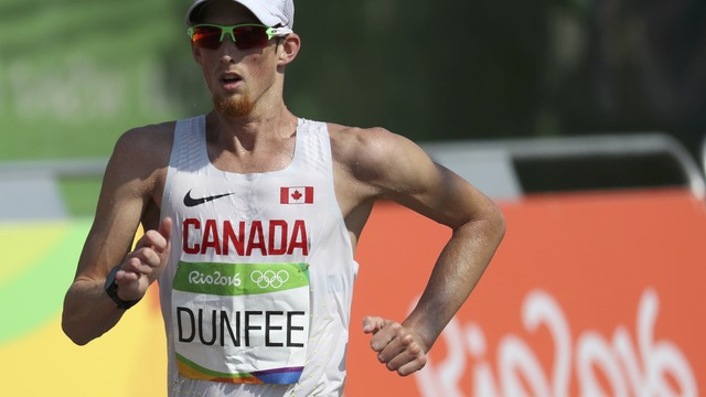 Canadian race walker awarded bronze after protest over collision