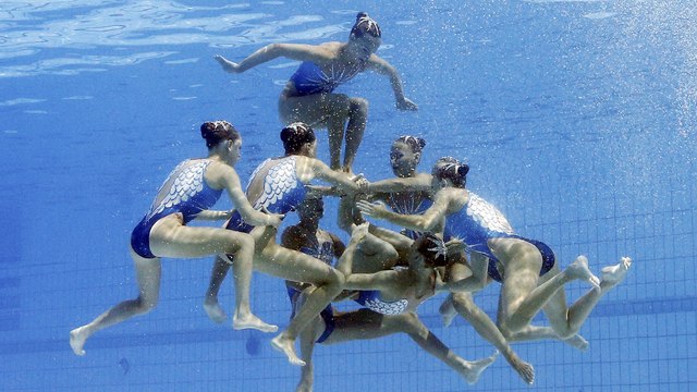 Russian mastery in synchronized swimming yields double gold