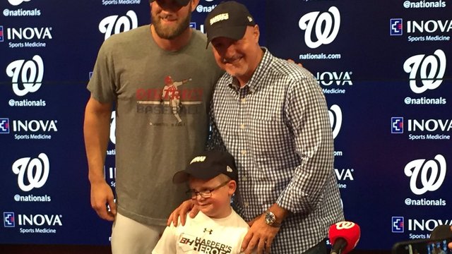 Harper unveils specially designed hat for charity