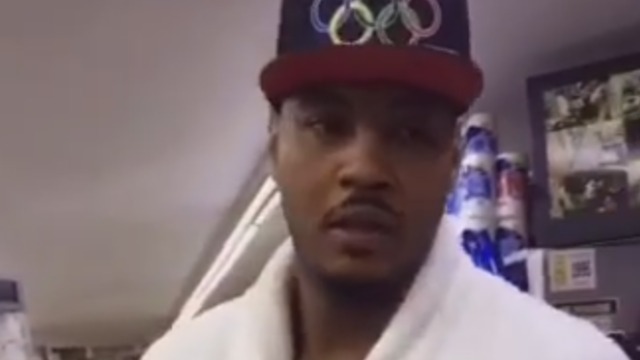 Melo strolls to corner store in custom bathrobe