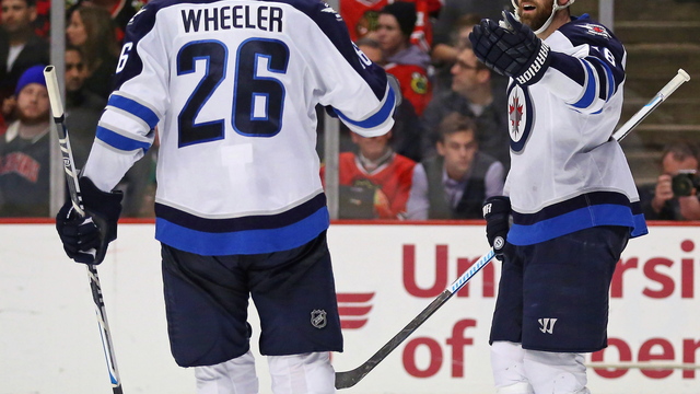 Ladd congratulates Wheeler on being named Jets captain