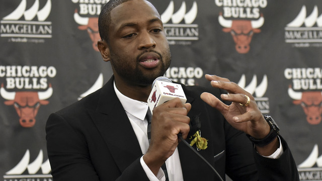 Wade bikes with police in Miami to promote unity