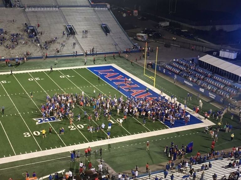 Kansas fans storm field after beating FCS opponent Rhode Island