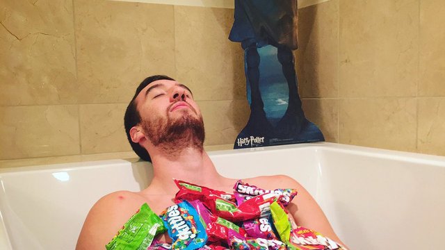 Kaminsky bathes in Skittles as Harry Potter's Dobby looks on