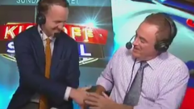 Was this handshake between Peyton Manning and Al Michaels awkward?
