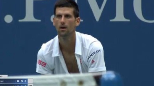 Djokovic rips shirt wide open before playing set point