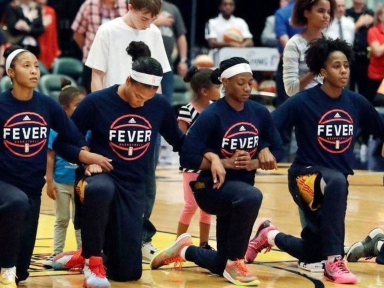 WNBA�s Fever kneel together as team in anthem protest