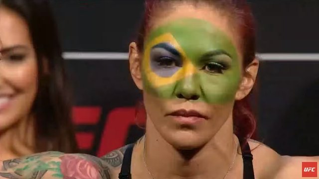 Cyborg rocks Brazilian flag face paint at weigh-ins