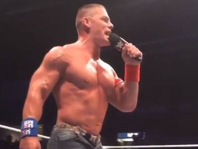 Cena sings 'Take Me Home, Country Roads' in middle of ring