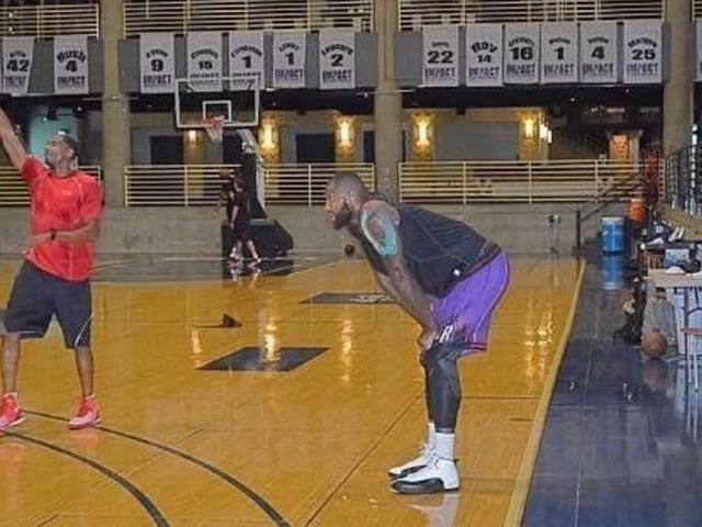 Boogie works out in retro Raptors shorts