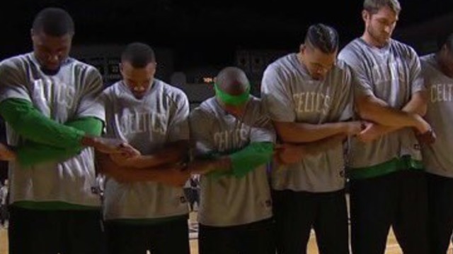 Celtics link arms in show of unity during national anthem