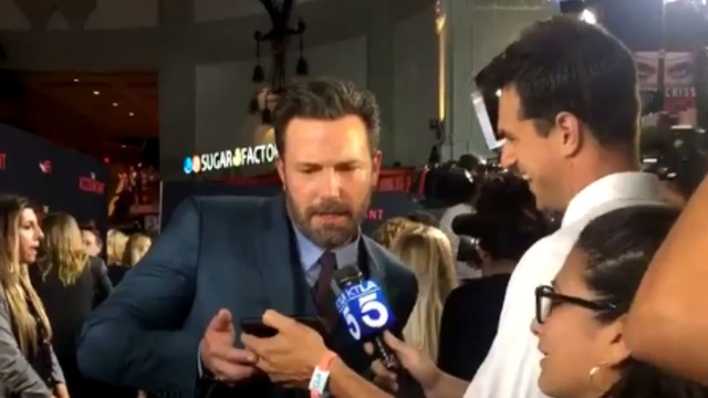Ben Affleck stops on red carpet to check Red Sox score