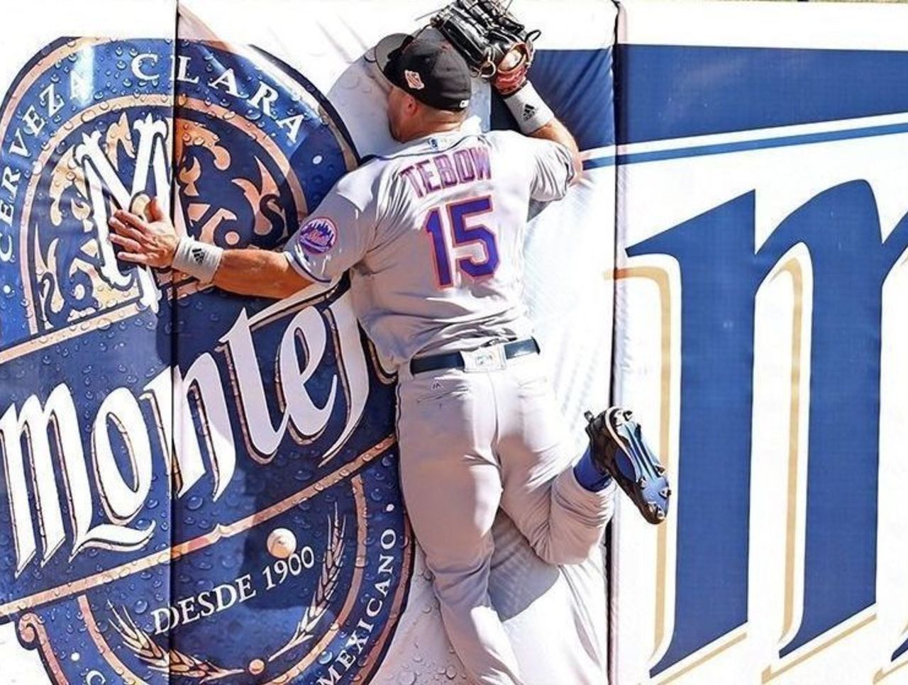 Here is a photo of Tim Tebow running directly into a wall in his Arizona  Fall League debut 