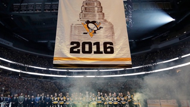 Penguins raise Stanley Cup banner