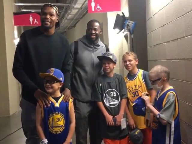 Warriors' Durant, Green meet young boy with leukemia