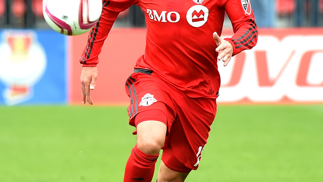 Toronto FC re-signs Delgado