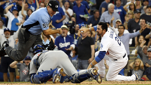 Umpires told Gonzalez he was safe on disputed call