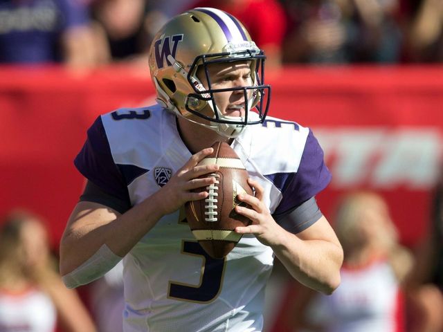 Watch: Jake Browning starts season by getting absolutely steamrolled