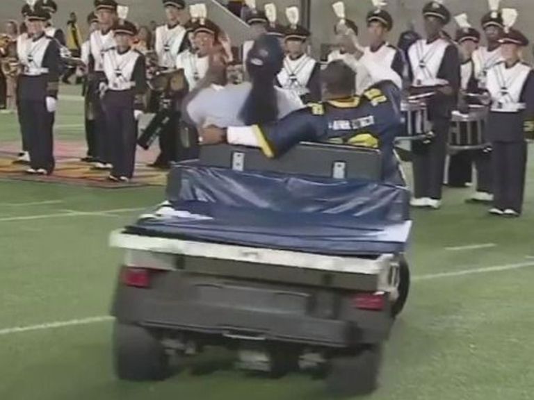 Marshawn Lynch Leads Cal Out Of Tunnel On Cart, Almost Hits Band ...