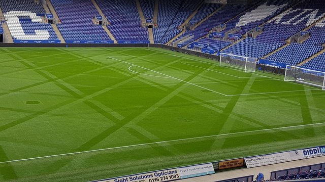 Leicester groundsmen mow poppy designs on King Power Stadium pitch