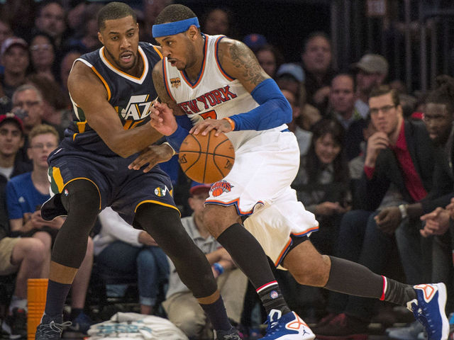 Melo sick of hearing about the triangle
