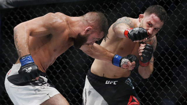 Edgar survives 3-round war to win unanimous decision over Stephens