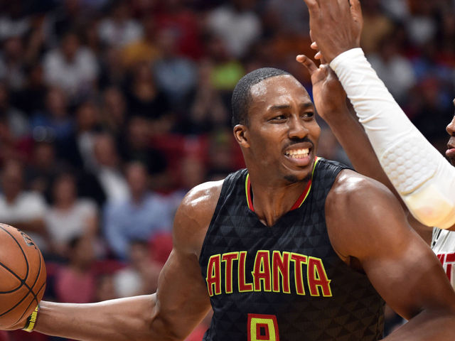Hawks' Howard ejected for elbowing Zeller in loss to Hornets