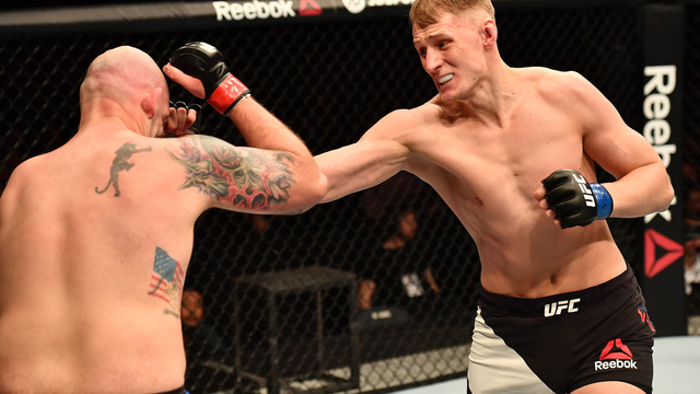 Volkov wears Johnson down to earn split decision in UFC debut