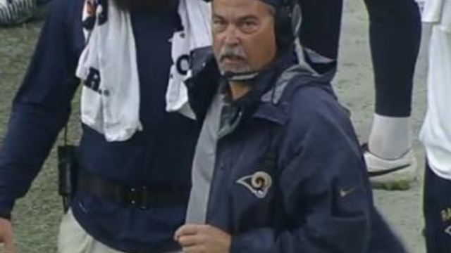 Jeff Fisher rocks the backwards hat