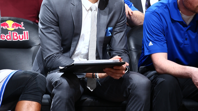 Injured Lin records stats on Nets bench