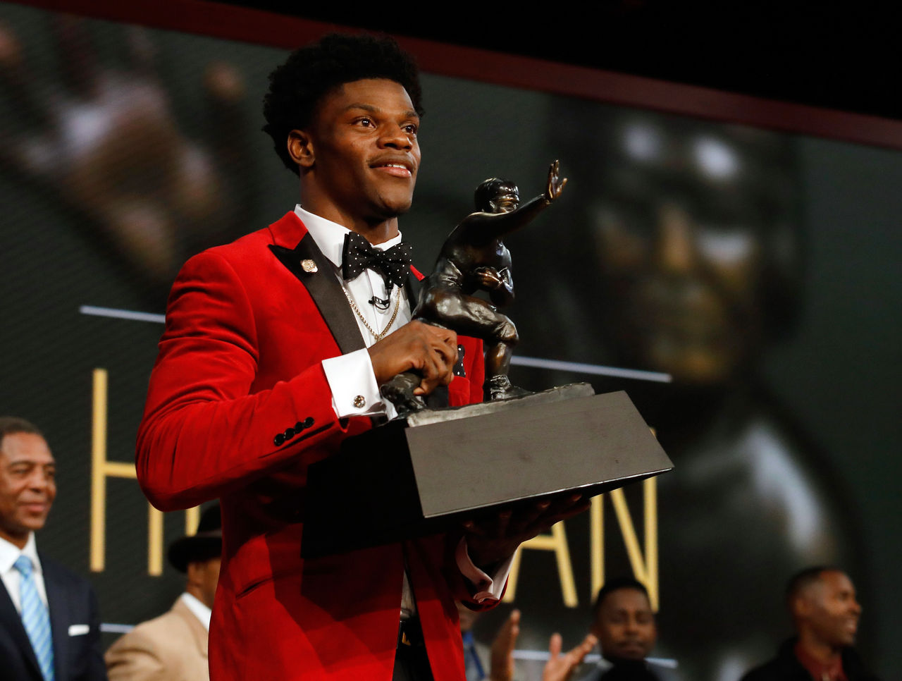 Look at Lamar Jackson's incredible Heisman suit jacket, which he