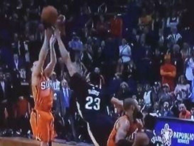 Davis deflects Booker's 3-point attempt to preserve Pelicans win
