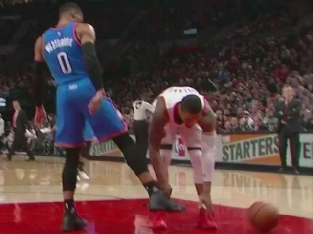 Westbrook kicks ball away from Lillard