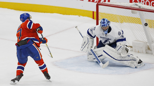 McDavid scores in shootout to lift Oilers over Lightning