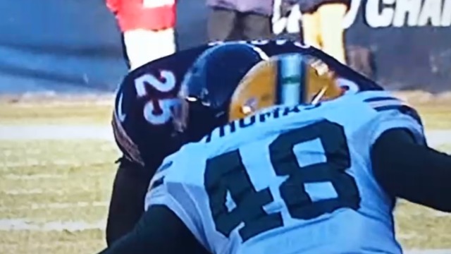 Bears RB hit so hard the logo flew off his helmet