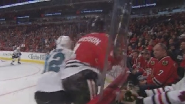 Blackhawks fan's dinner goes flying on hard hit against glass
