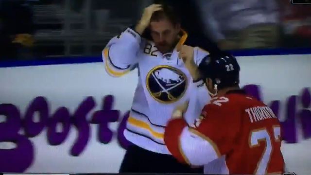 Watch: Sabres' Foligno takes time to fix hair during fight