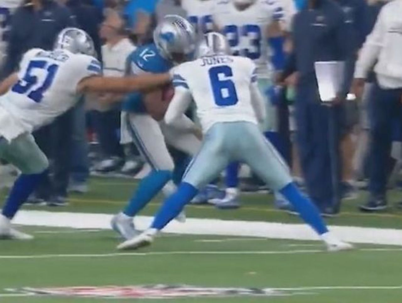 Cowboys punter Chris Jones lays out Andre Roberts