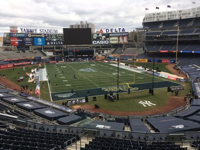 Yankee Stadium converts to football field for Pinstripe Bowl