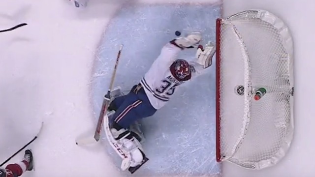 Montoya stones Ekblad with diving glove stop