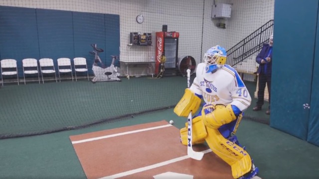Blues' Hutton has baseballs fired at him from pitching machine