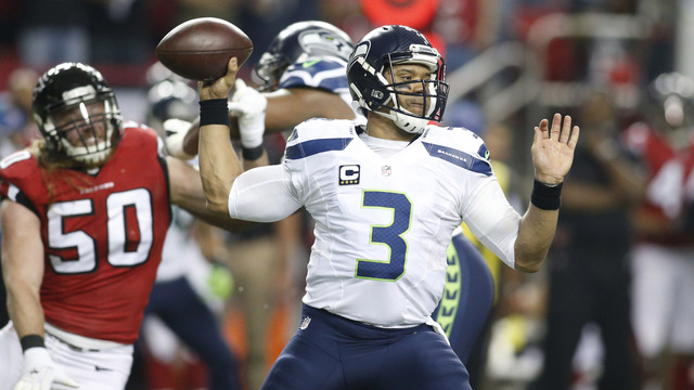 Watch: Wilson trips over lineman's foot, leading to safety