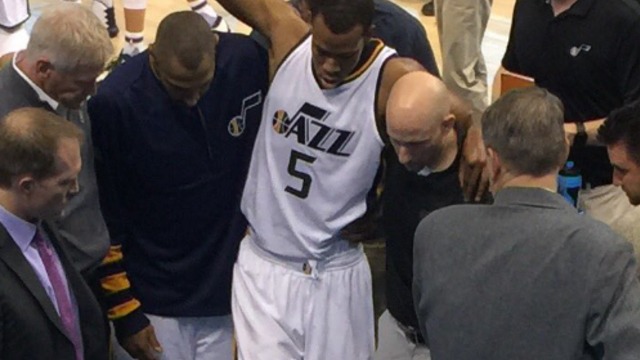 Jazz's Hood helped off court after suffering hyperextended knee