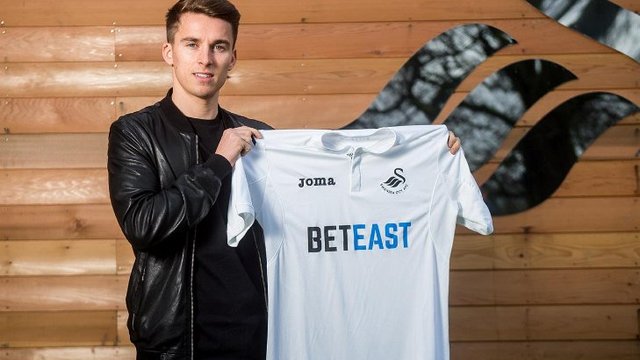 Swansea brokers return for Tom Carroll from Tottenham