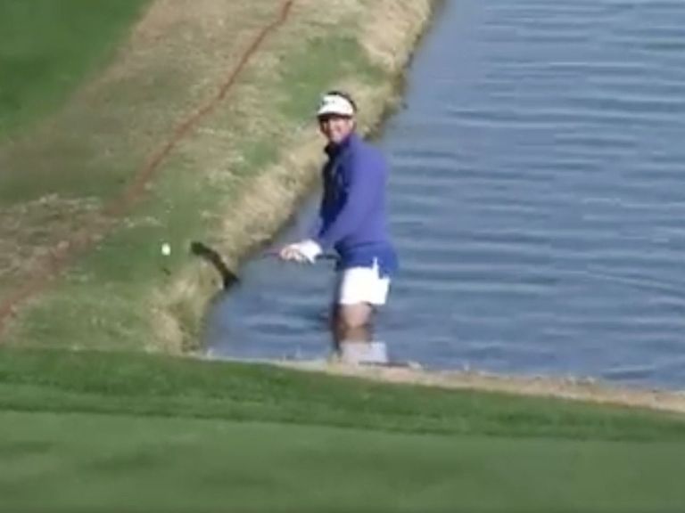 Golfer strips down to underwear to take shot from water hazard ...