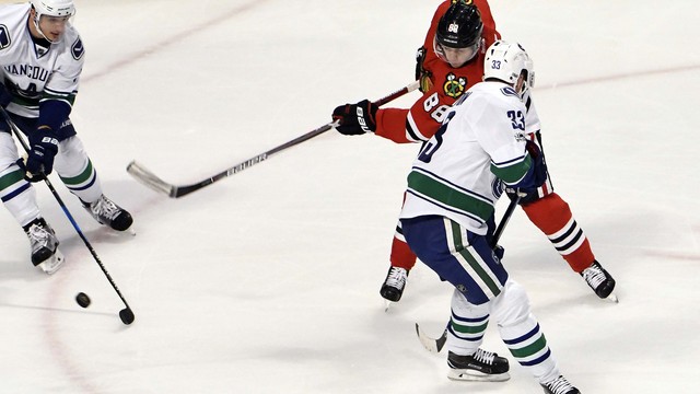 No room? Patrick Kane disagrees, picks corner on Ryan Miller