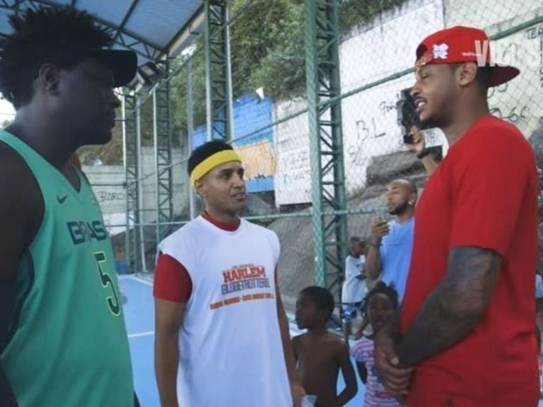 Melo visits Rio favelas during Olympic tour