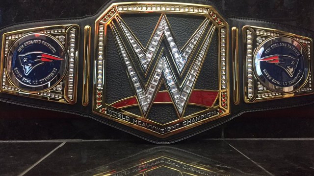 Patriots receiving custom-plated title belt from WWE